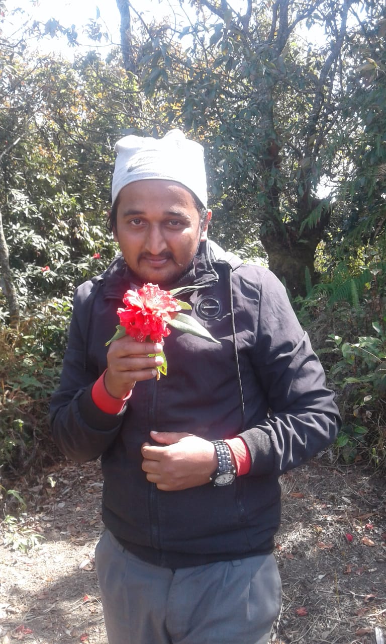 Visiting Prabhudam in Araba with Rhododendron Flower
